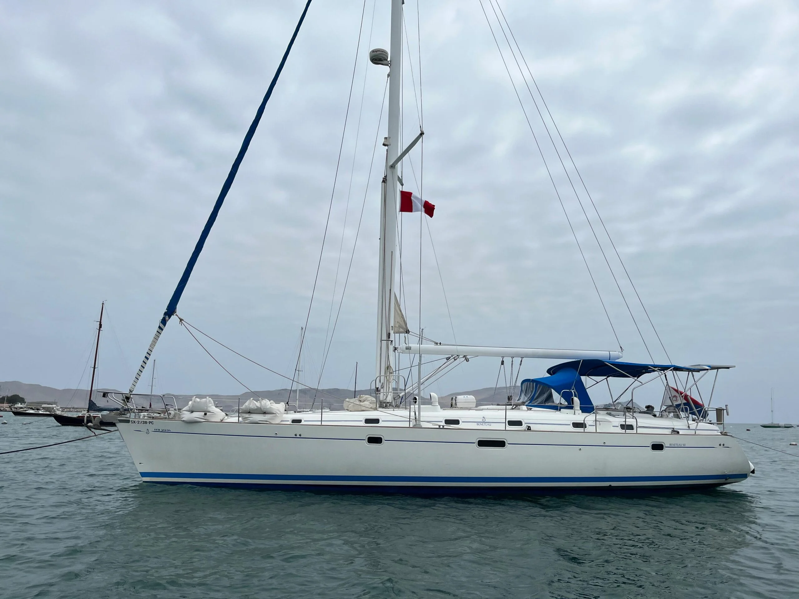Beneteau 50 Ma Mousse by Different Sailing moored in marina